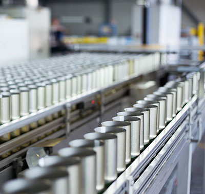 linear mass sensor for machine speed modulation on can making lines