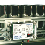 linear mass sensor for monitoring can density on single file conveyors